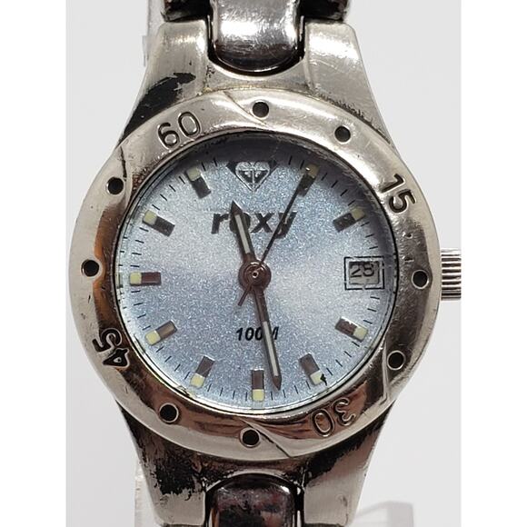Roxy women's watch. Blue iridescent face. Calendar on watch face. working watch - Picture 1 of 7